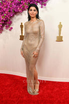 Claudia Doumit champagne glitter prom dress 2024 Oscars red carpet 