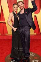 Claudia Sulewski black plunging neck prom dress 2024 Oscars after party