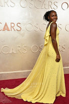 Coco Gauff yellow Watteau train 2025 Oscars red carpet dress