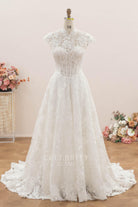 corded lace cap sleeve wedding dress