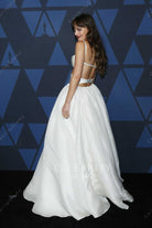 Dakota Johnson white crisscross back dress governor awards 2019