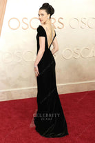 deep v back Margaret Qualley 2025 Oscars red carpet dress