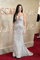 Demi Moore silver v neck 2025 Oscars red carpet dress