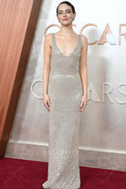 Emma Stone plunging neck 2025 Oscars red carpet dress