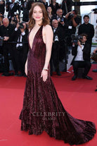 Emma Stone shimmery cabernet formal dress Cannes film festival red carpet 2024