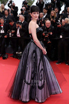 Eva Green open back formal gown Cannes film festival red carpet 2024