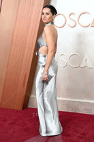 Felicity Jones 2025 Oscars red carpet open back formal dress