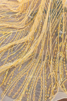gold beaded illusion train prom dress