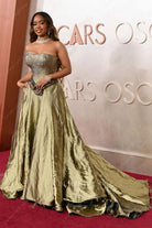 H.E.R. 2025 Oscars red carpet flowing train prom dress