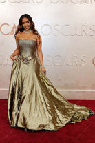H.E.R. metallic gold 2025 corset Oscars red carpet prom dress