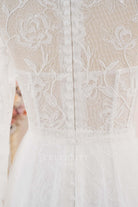 illusion buttoned back wedding dress