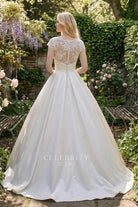 illusion lace buttoned back wedding ballgown 