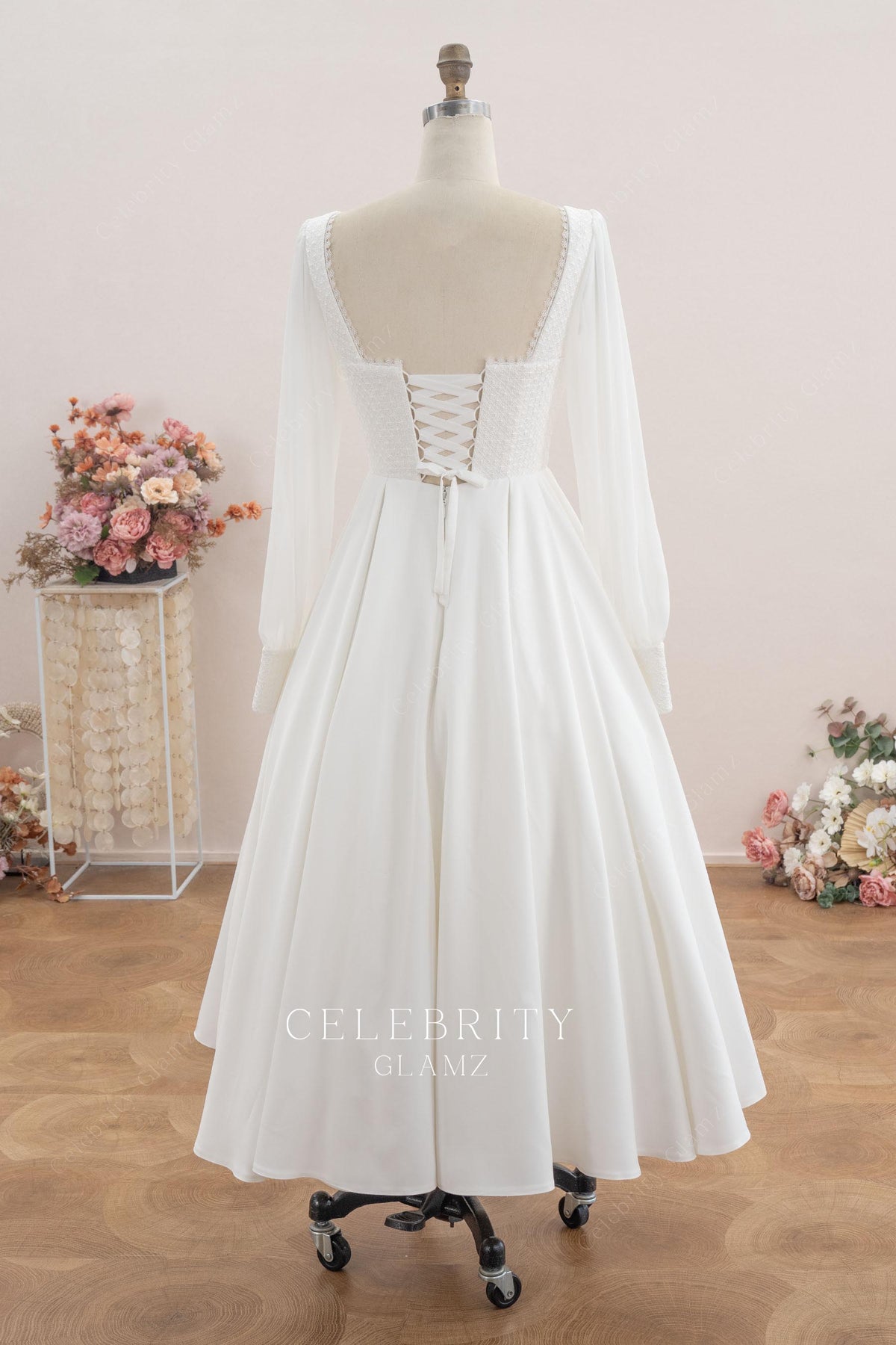 illusion long sleeved wedding dress