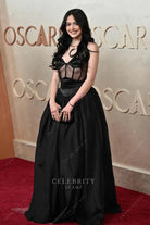 Josephine Reitman visible boning 2025 Oscars red carpet ballgown