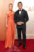 Kelly Ripa orange streamer 2025 Oscars red carpet dress