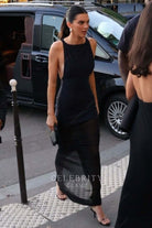 Kendall Jenner dark navy dress 2024 hosts cocktail event