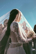 Kim Kardashian illusion back bridal dress