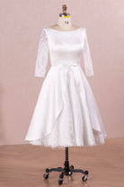 lace sleeve tea length wedding dress