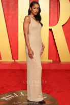 Laura Harrier nude beige glitter prom dress 2024 Oscars after Party 