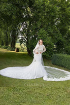 Lauren Sanchez trumpet 2025 cathedral train wedding dress