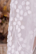 leaf lace illusion sleeve bridal gown