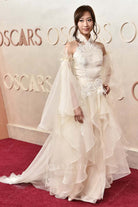 LeendaDong pale wheat a line 2025 Oscars red carpet dress