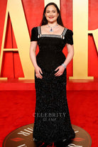 Lily Gladstone black fit flare dress 2024 Oscars after party