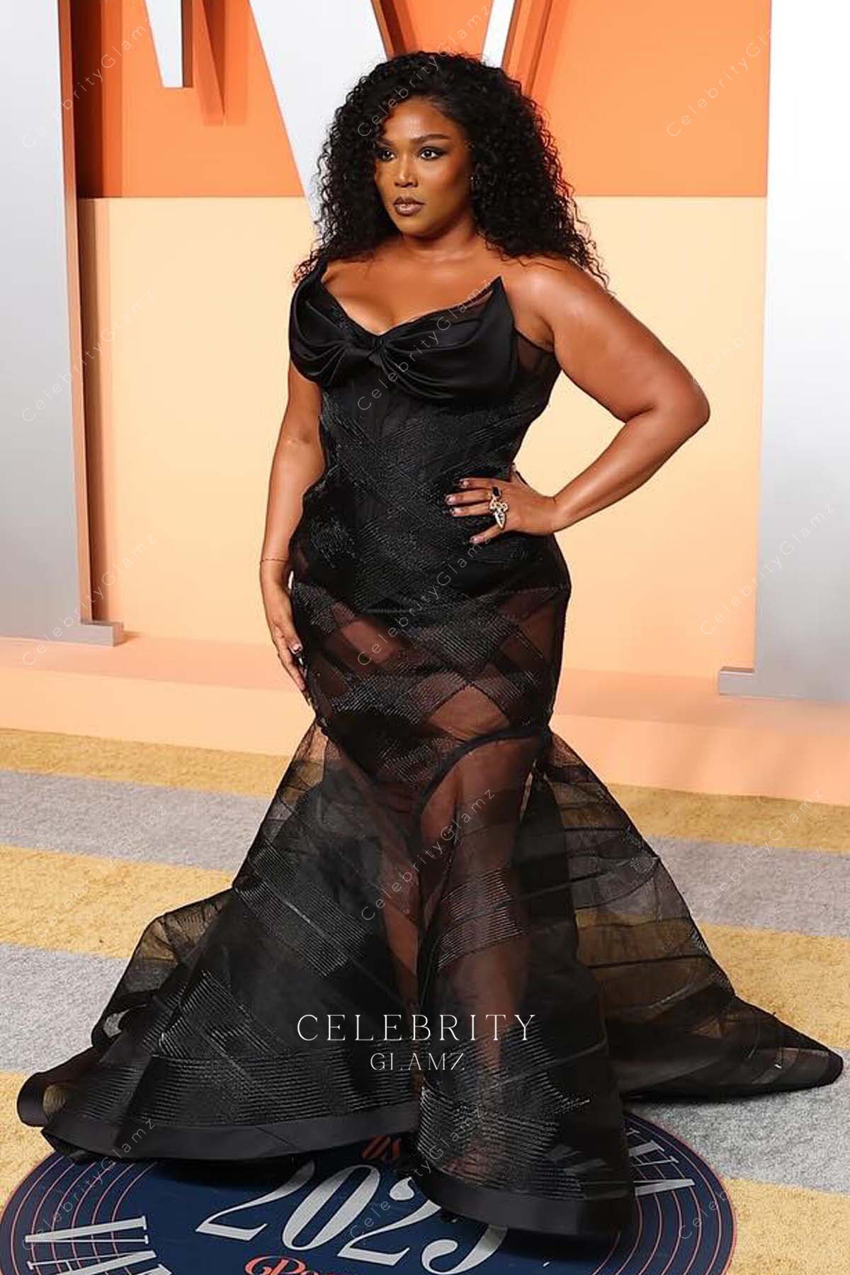 Lizzo 2025 Vanity fair party sheer trumpet dress