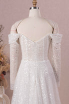 long sleeved v back wedding dress