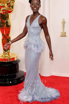 Lupita Nyong'o sweep train formal dress 2024 Oscars red carpet