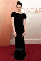 Margaret Qualley black off shoulder prom dress 2025 Oscars red carpet