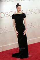 Margaret Qualley fit flare 2025 Oscars red carpet dress