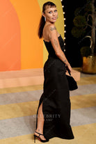 Miley Cyrus black 2025 Vanity fair party high slit dress