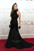 Miley Cyrus chapel train 2025 Oscars red carpet formal dress