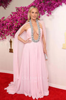Molly Sims pink cape prom dress 2024 Oscars red carpet