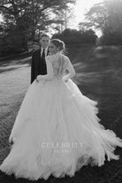 Naomi Biden white illusion back wedding dress
