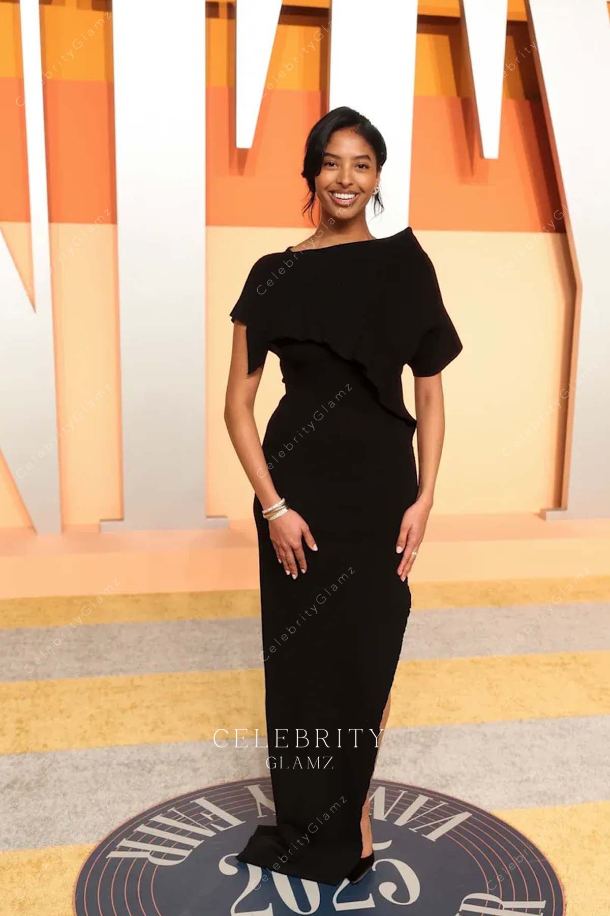 Natalia Bryant black 2025 split sheath Oscars Vanity party dress