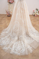 nude pink floral lace train wedding dress