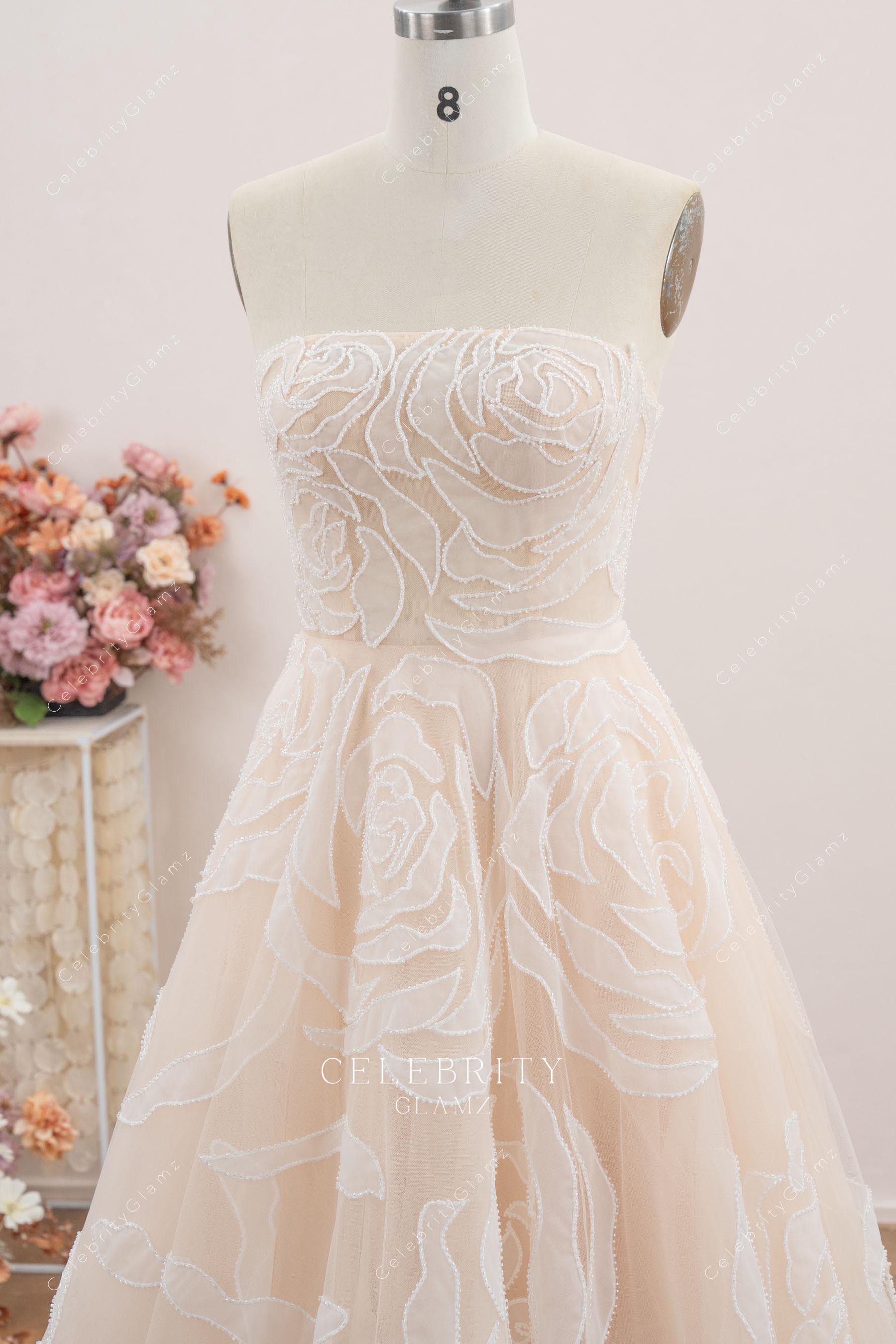 nude pink strapless wedding dress