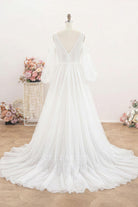nude pink tulle long train wedding dress