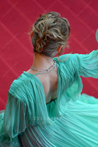 Olivia DeJonge plunging back 2022 AMFAR gala Cannes red carpet dress