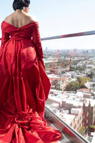 open v back 2025 Oscars red carpet red Adriana Paz dress
