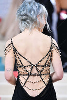 Phoebe Bridgers strappy back met gala 2023 dress