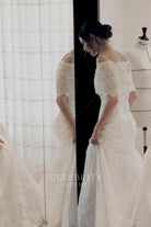 Phoebe Tonkin white lace wedding dress
