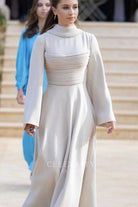 Princess Iman taupe long sleeves 2023 prince al Hussein royal wedding guest dress