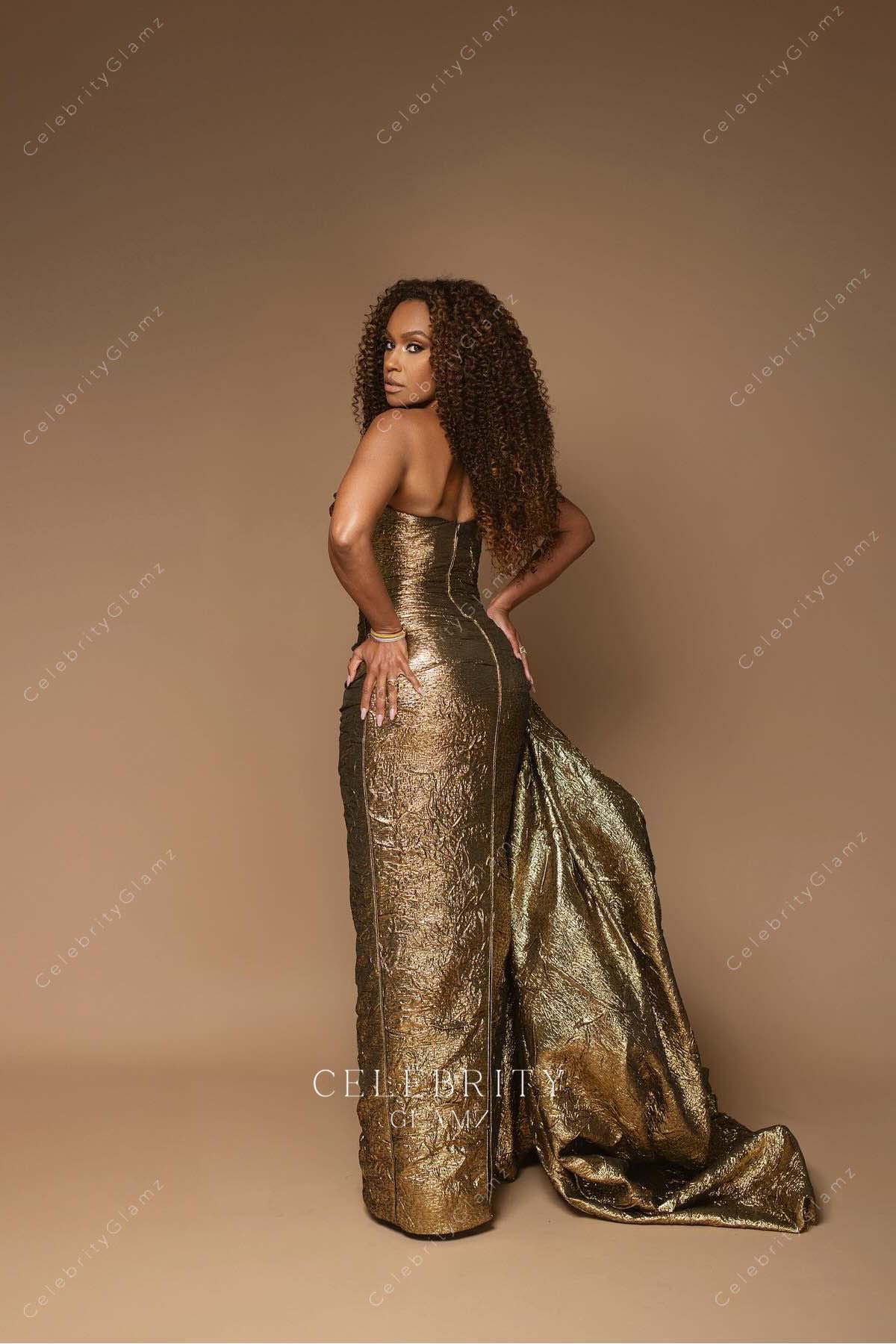 Ryan Michelle Bathe metallic gold 2025 Oscars red carpet floor length  dress