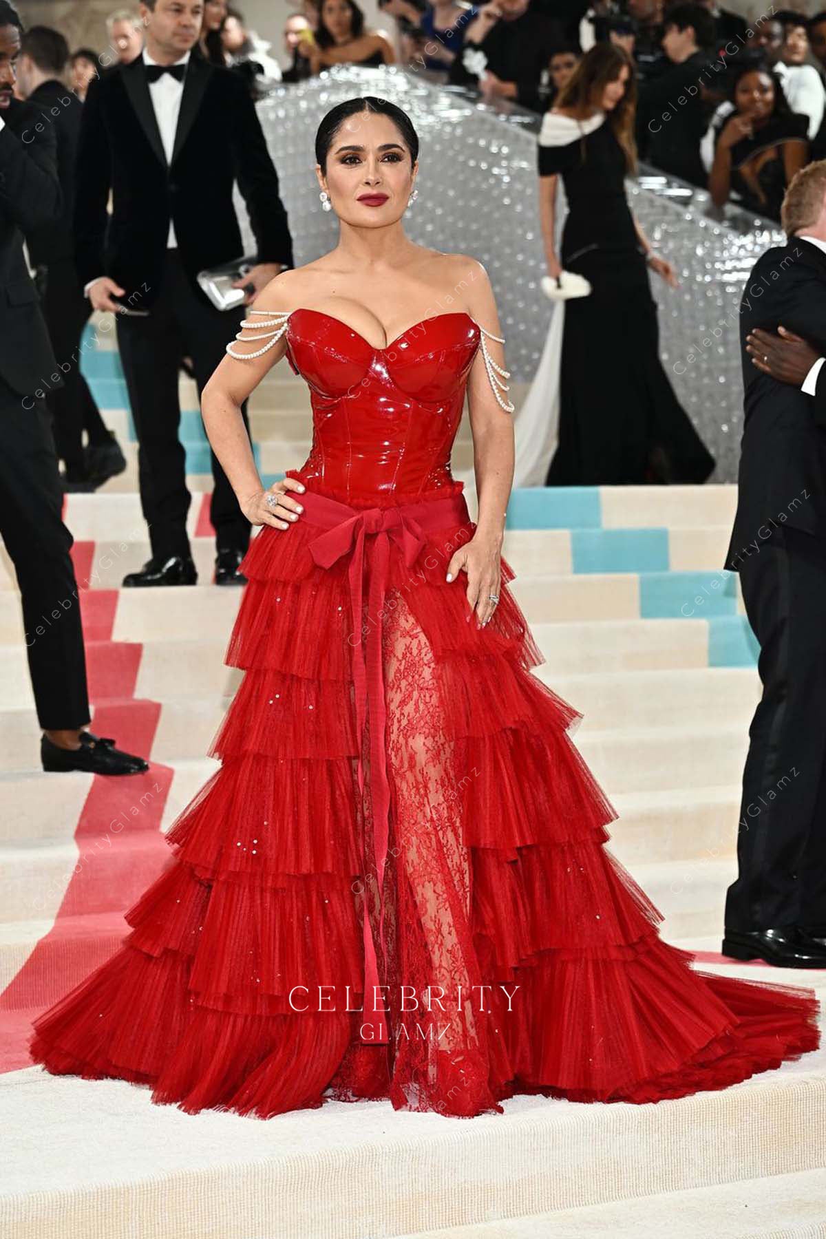 Salma Hayek red off shoulder met gala dress