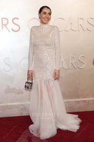 Sarah Nuth ivory sequin 2025 Oscars red carpet prom dress