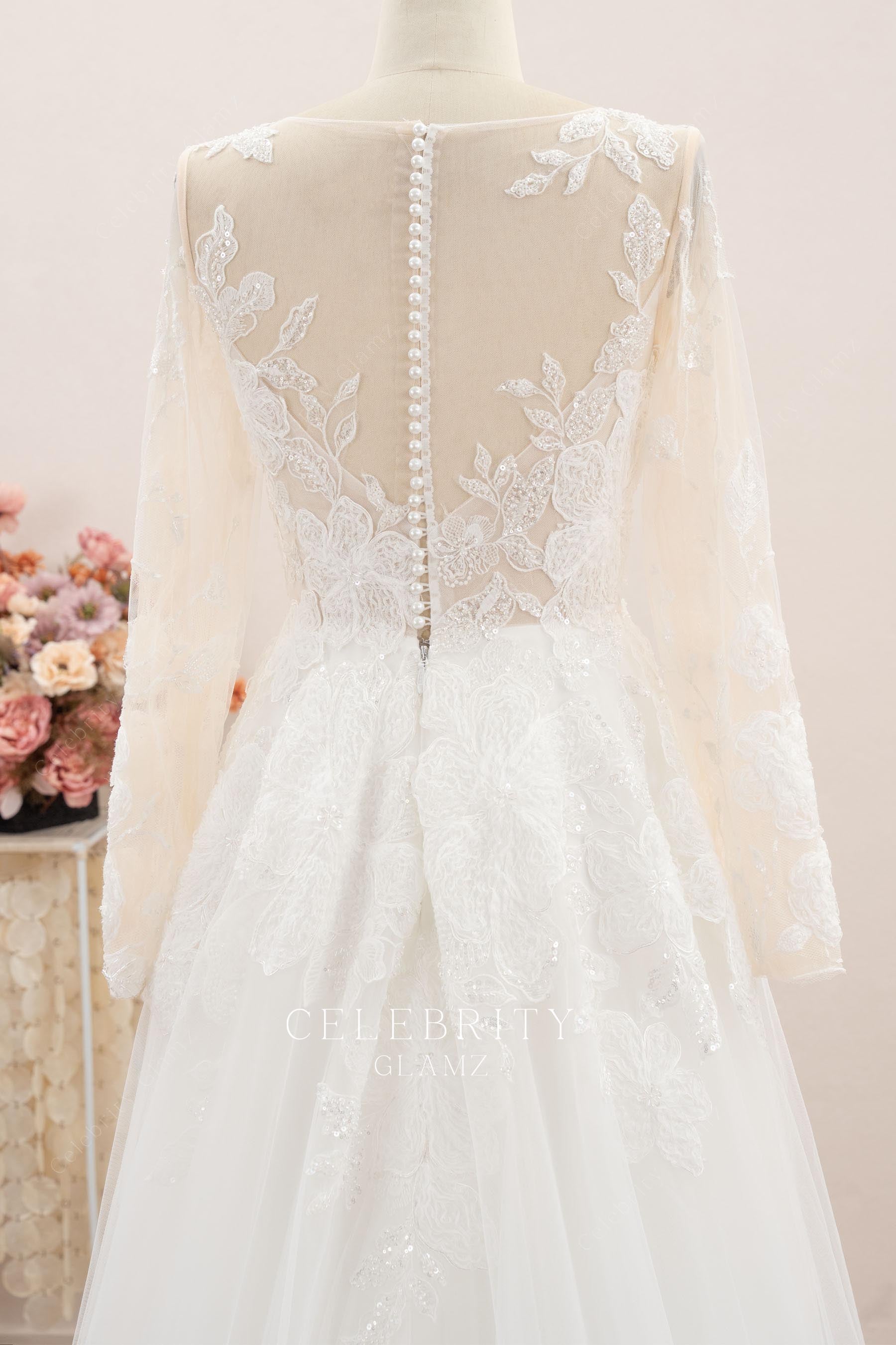 see through lace buttoned back wedding dress
