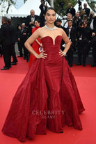 Shanina Shaik burgundy sheath prom gown Cannes film festival red carpet 2024